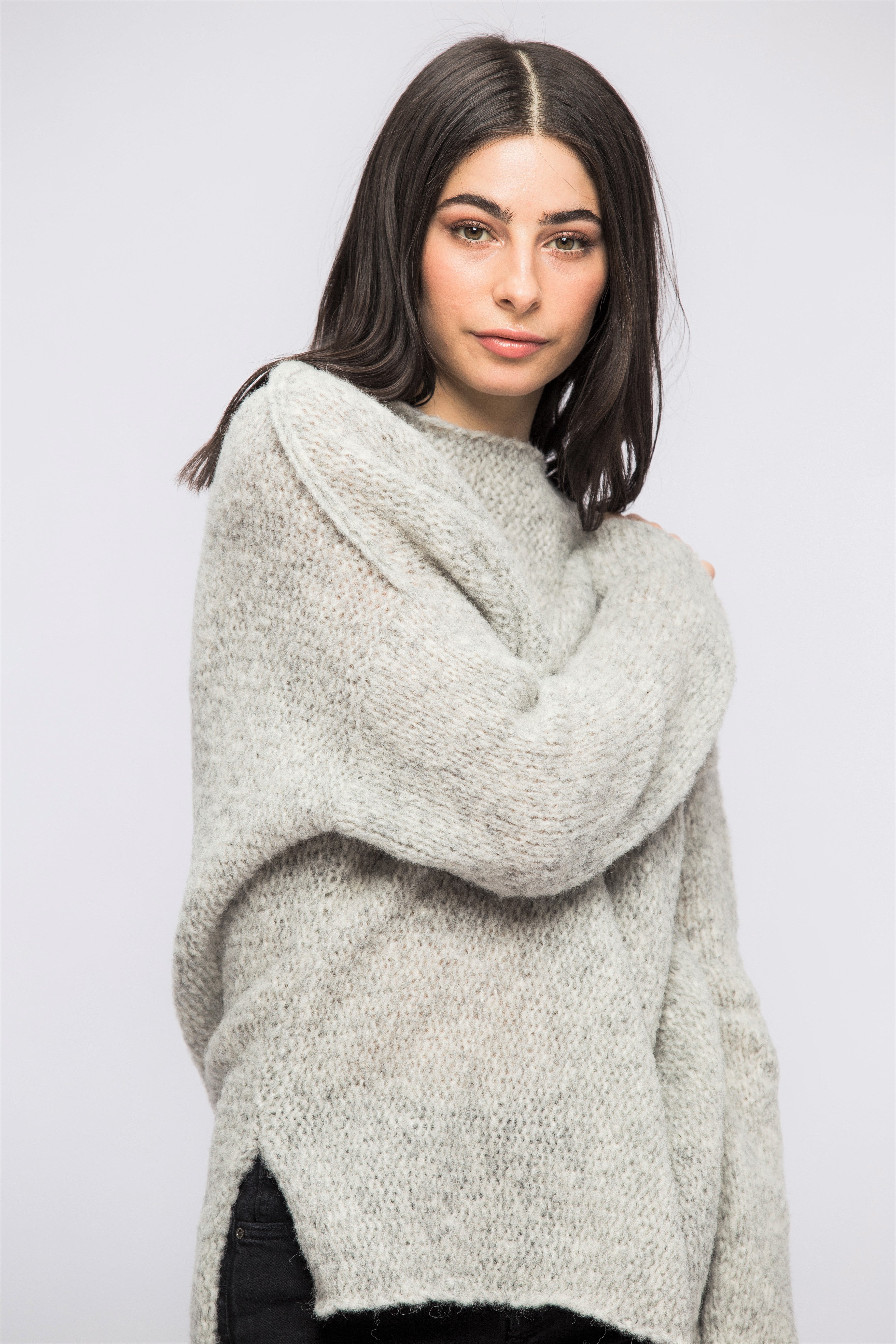 Light grey alpaca oversized woman knit sweater.